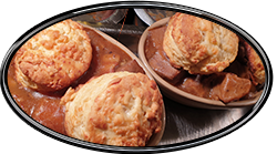 beef bacon onion cobbler with cheese scones on top